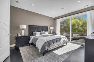 Bedroom with access to outside and recessed lighting