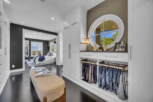 Sitting room with recessed lighting, dark wood finished floors, and baseboards