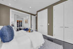 Bedroom featuring recessed lighting, a closet, and baseboards