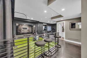 Bar area featuring recessed lighting