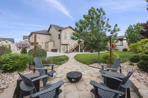 View of patio / terrace with a fire pit area