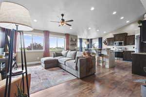Living room with ceiling fan, recessed lighting, plenty of natural light, LVP flooring