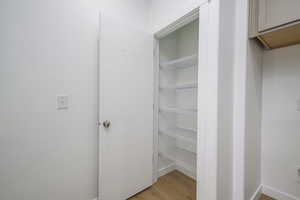 With built-in shelving and a thoughtful layout, this linen closet helps keep the rest of the home feeling fresh and clutter-free.