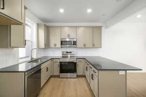 this bright kitchen features modern finishes, a quartz island, and just the right amount of charm for everyday living.