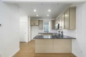 this bright kitchen features modern finishes, a quartz island, and just the right amount of charm for everyday living.