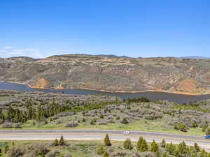 View of mountain background featuring a large body of water