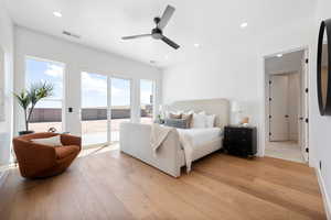 Bedroom with access to exterior, light wood-style flooring, recessed lighting, and ceiling fan