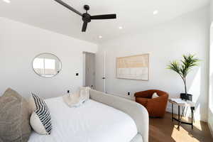 Bedroom featuring wood finished floors, recessed lighting, a ceiling fan, and baseboards