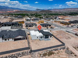 Aerial view of residential area with mountains