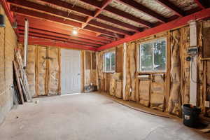 Miscellaneous room with concrete floors