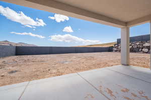 Fenced backyard featuring a patio area