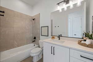 Full bath featuring vanity and shower / bathtub combination