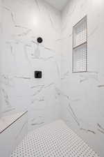 Bathroom with a tile shower