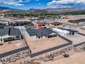 Aerial view of residential area with a mountainous background