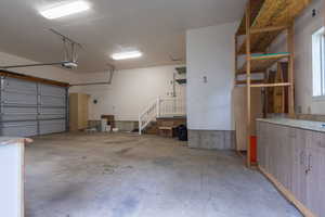 Garage featuring a garage door opener