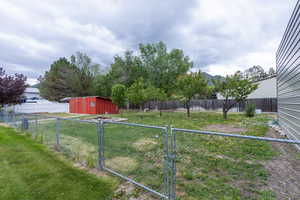 View of yard featuring a gate