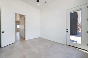 Spare room featuring ceiling fan, baseboards, and recessed lighting