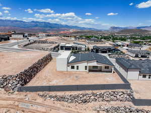 Aerial view of residential area with mountains