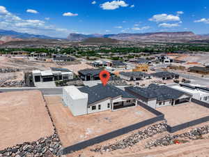 Aerial view of residential area with a mountain backdrop