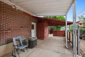 View of patio / terrace with central AC unit
