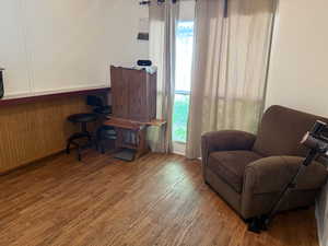Living area featuring wood finished floors and healthy amount of natural light