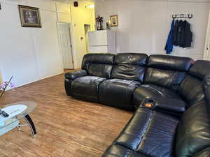 Living area featuring wood finished floors