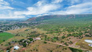 Aerial overview of property's location with mountains and rural landscape