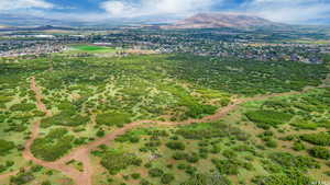 Aerial view of property's location featuring mountains