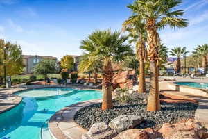 Community pool with a patio