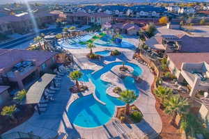 Aerial view of residential area featuring a pool area