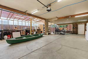 Garage featuring a garage door opener