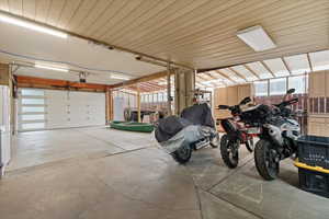 Garage featuring a garage door opener