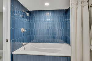 Bathroom featuring shower / tub combo