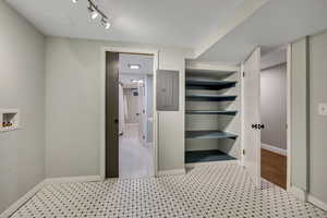 Spacious closet with electric panel