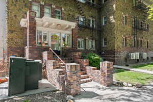 View of front of property featuring brick siding