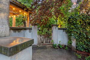 View of patio / terrace with a gate and fence