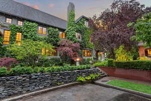 View of front of property featuring a chimney