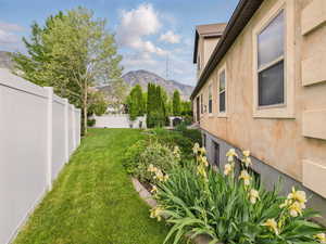 View of  side yard with a mountain view