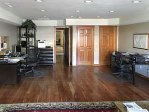 Office space with recessed lighting and wood finished floors- upstairs of main home