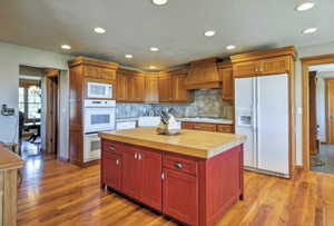 Kitchen with large center island, and lots of cabinetry