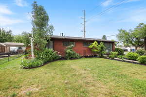 View of front of property with brick siding