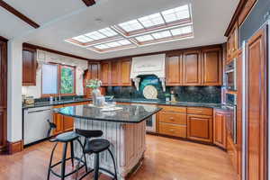 Kitchen with stainless steel appliances and hardwood floors