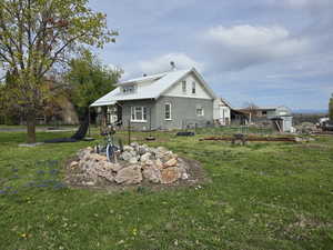 front of house featuring stucco siding