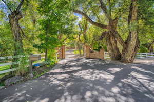 Surrounding community with fence and a gate