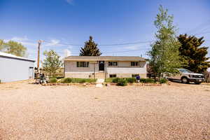 View of front of home featuring brick.