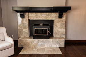 Detailed view of baseboards and wood finished floors