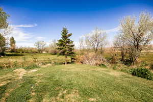 View of yard featuring a view of countryside