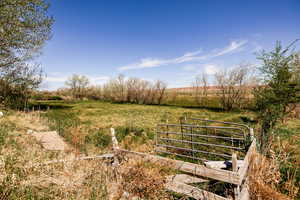 View of yard with a view of countryside