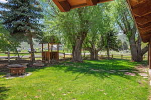 View of yard featuring a fire pit