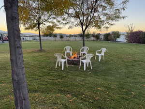 View of yard featuring a fire pit